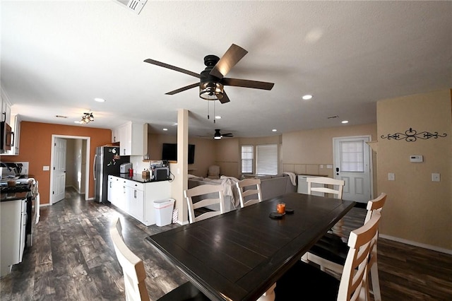 dining room featuring dark wood-type flooring and ceiling fan