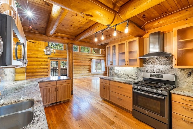 kitchen with stainless steel appliances, wooden ceiling, wall chimney exhaust hood, and tasteful backsplash