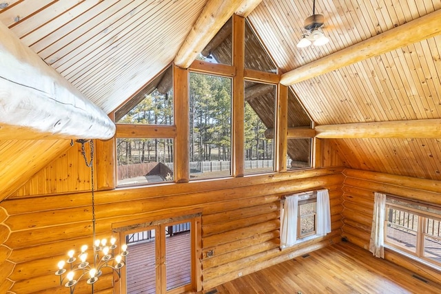 additional living space with wooden ceiling, high vaulted ceiling, beamed ceiling, and wood finished floors