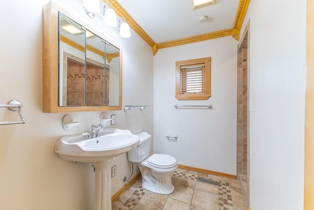 full bath featuring ornamental molding, tile patterned flooring, baseboards, and toilet