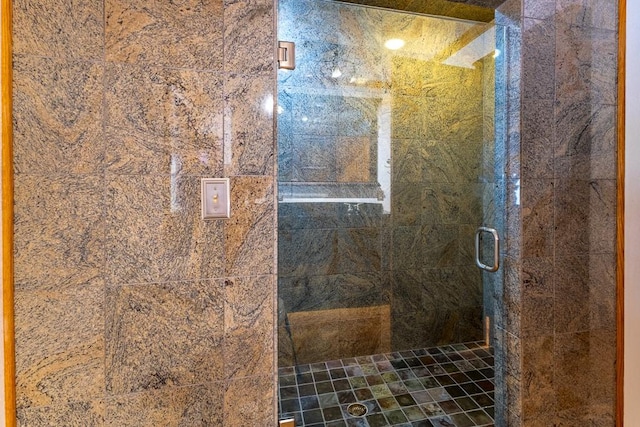 bathroom featuring a stall shower