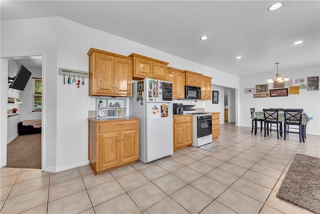 1408 N B St, Rogers, AR 72756 - kitchen with white appliances, a chandelier, recessed lighting, light tile patterned floors, and hanging light fixtures
