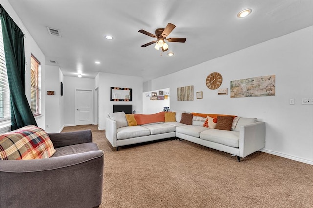1408 N B St, Rogers, AR 72756 - living area with carpet floors, ceiling fan, baseboards, and recessed lighting