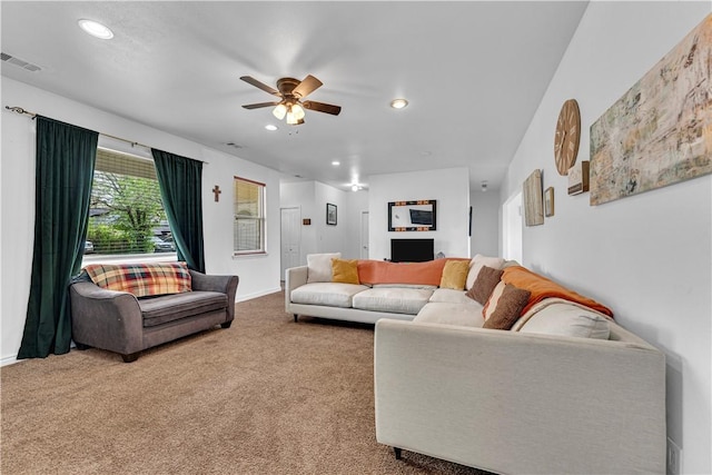 1408 N B St, Rogers, AR 72756 - carpeted living room featuring a ceiling fan, recessed lighting, and baseboards
