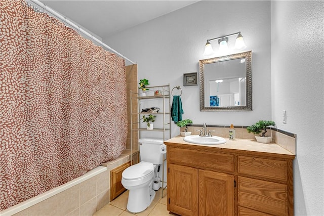 1408 N B St, Rogers, AR 72756 - bathroom featuring tile patterned flooring, vanity, toilet, and shower / bath combo with shower curtain