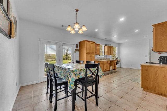 1408 N B St, Rogers, AR 72756 - dining space with a chandelier, baseboards, light tile patterned floors, and recessed lighting