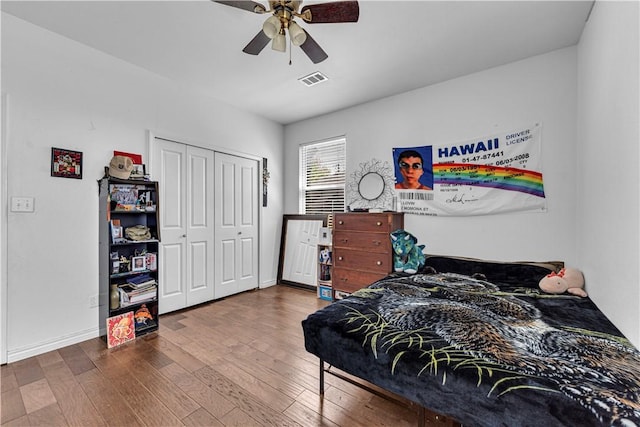 1408 N B St, Rogers, AR 72756 - bedroom with hardwood / wood-style floors, a ceiling fan, and a closet