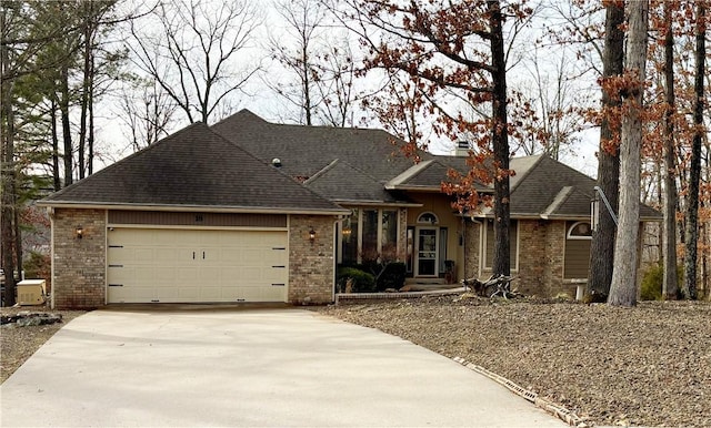 ranch-style house featuring a garage