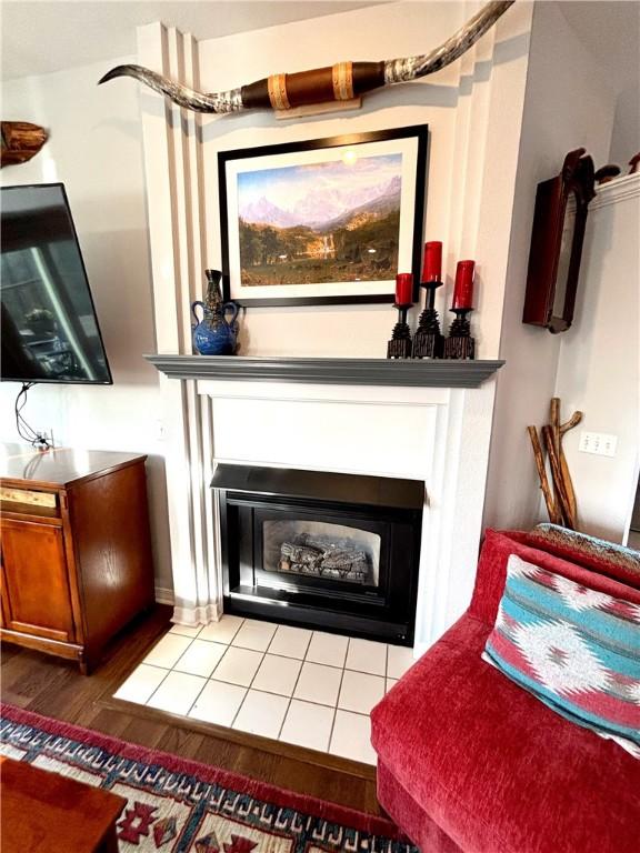 interior details with hardwood / wood-style flooring