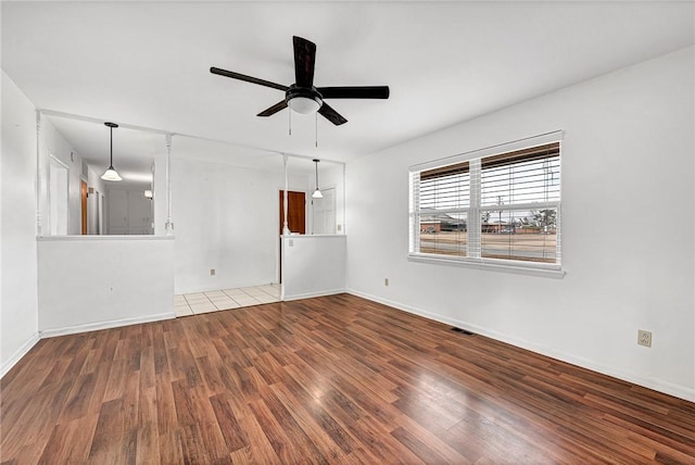 913 17th St, Rogers, AR 72758 - empty room featuring wood-type flooring and ceiling fan