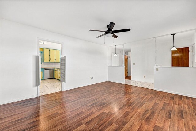 913 17th St, Rogers, AR 72758 - unfurnished room with ceiling fan and light hardwood / wood-style flooring