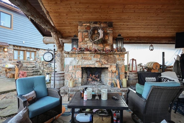 living room featuring a stone fireplace, rustic walls, beam ceiling, and wooden ceiling