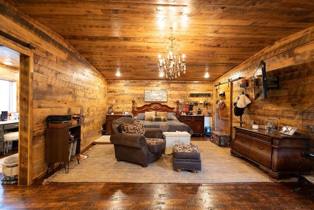 bedroom with lofted ceiling, a barn door, hardwood / wood-style floors, and wooden ceiling