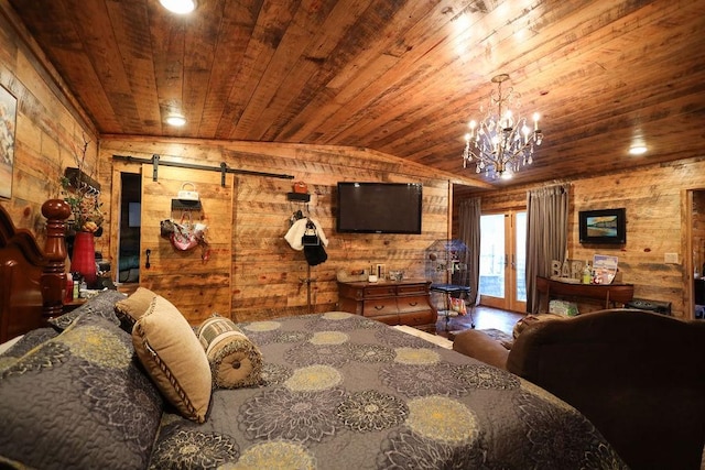 bedroom featuring wood ceiling, access to outside, a barn door, and wood walls