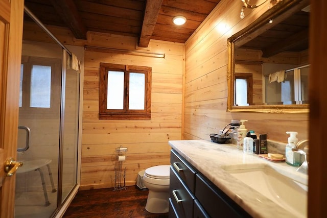 bathroom with wood ceiling, vanity, wooden walls, and a shower with shower door