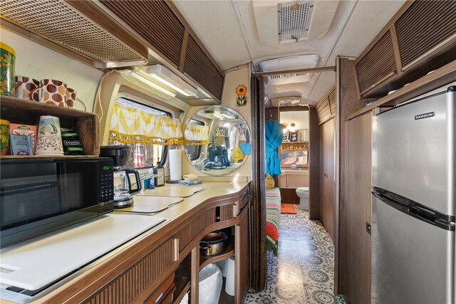 kitchen with stainless steel fridge