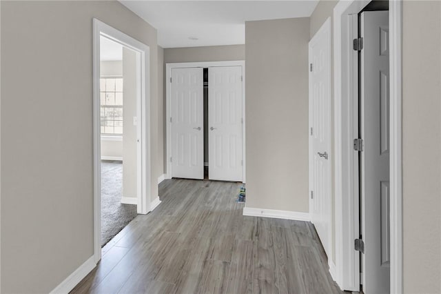 hallway featuring light hardwood / wood-style flooring