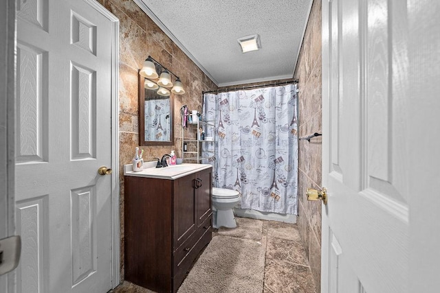 full bathroom with vanity, tile walls, shower / bath combination with curtain, and a textured ceiling