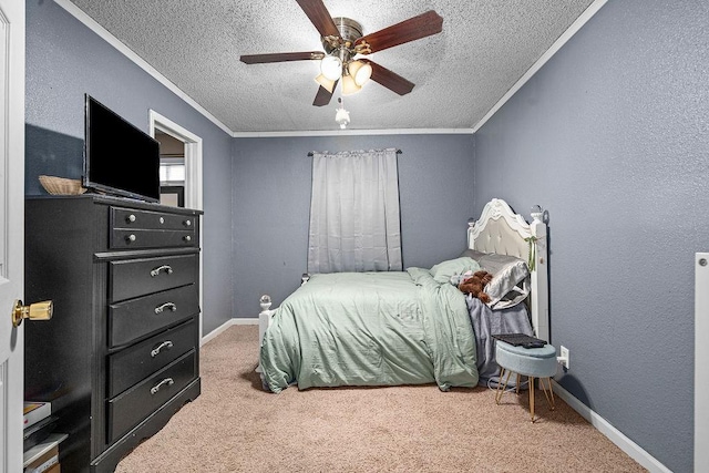 bedroom with ornamental molding, carpet flooring, ceiling fan, and a textured ceiling