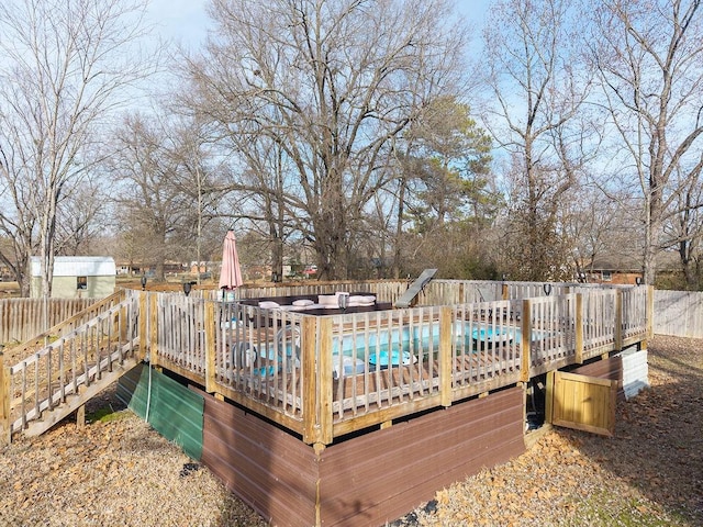 deck with a covered pool