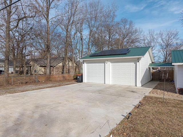 garage featuring solar panels