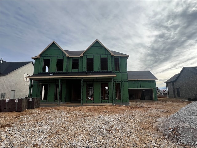 view of front of home featuring central air condition unit