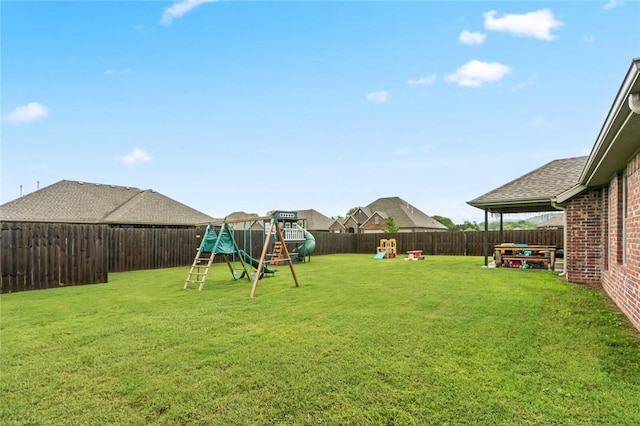 view of yard with a playground