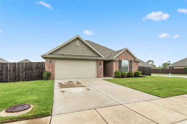 single story home with a garage and a front lawn