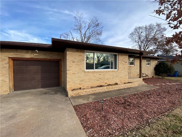 single story home featuring a garage