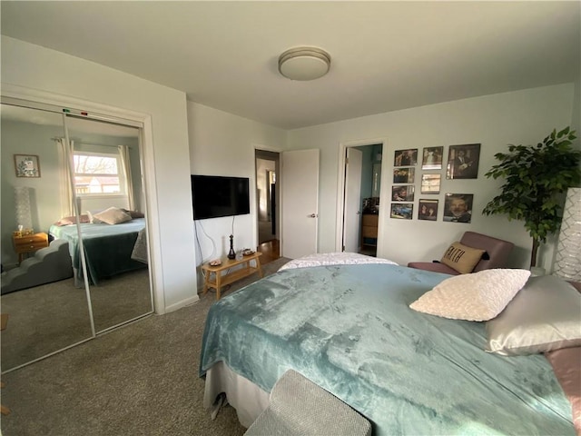 bedroom with carpet floors and a closet