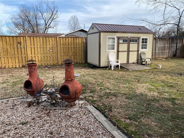 view of yard with a storage shed