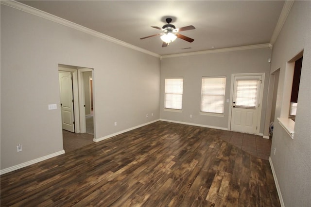 empty room with crown molding, dark hardwood / wood-style floors, and ceiling fan