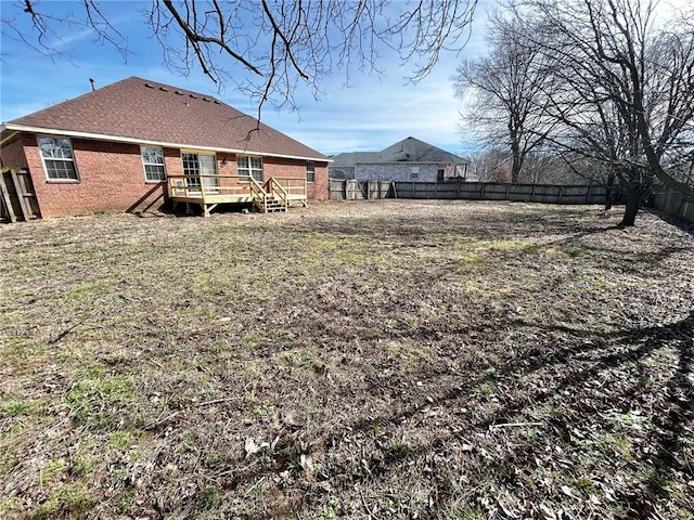 view of yard featuring a deck