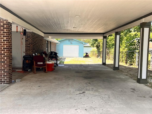 exterior space featuring a garage and an outdoor structure