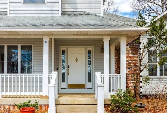 entrance to property with a porch