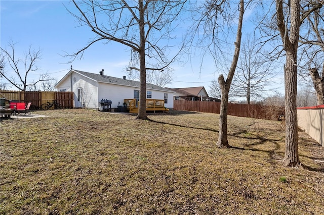 view of yard featuring a wooden deck