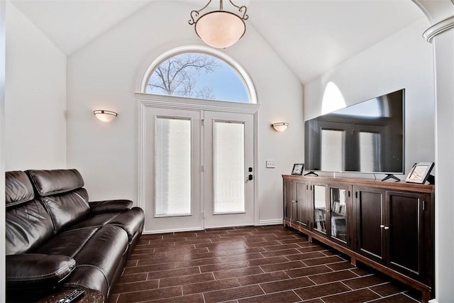 foyer entrance with high vaulted ceiling