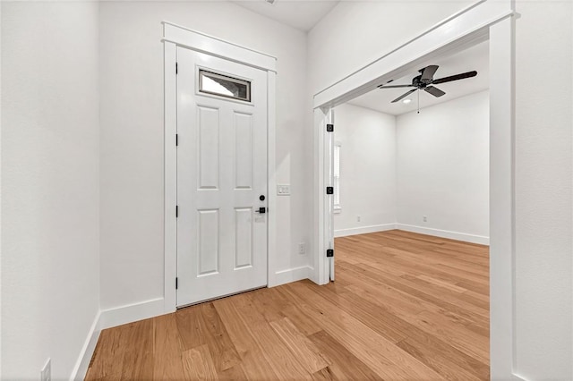 entryway featuring light hardwood / wood-style flooring and ceiling fan