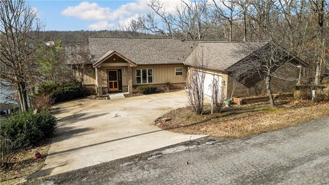 single story home with a garage