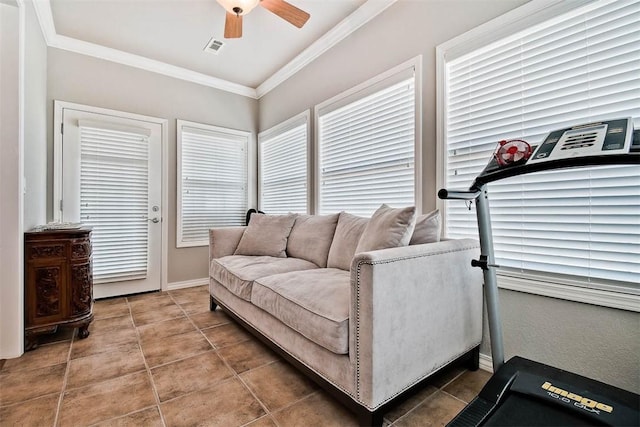 living room featuring ornamental molding and ceiling fan