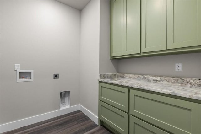 laundry area with cabinets, washer hookup, dark hardwood / wood-style floors, and electric dryer hookup