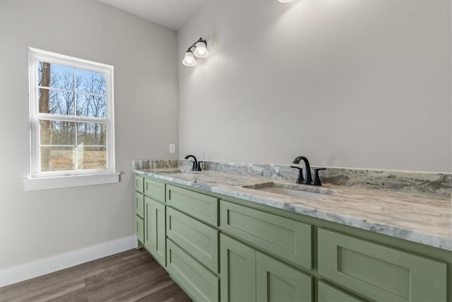 bathroom with vanity and hardwood / wood-style flooring