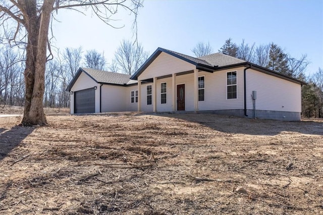 ranch-style home with a garage