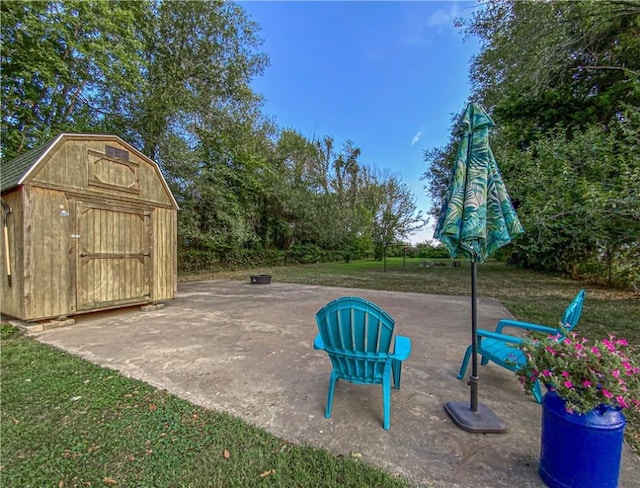 view of patio featuring a shed