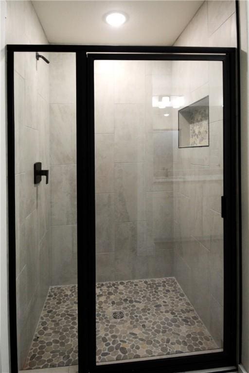 bathroom featuring an enclosed shower