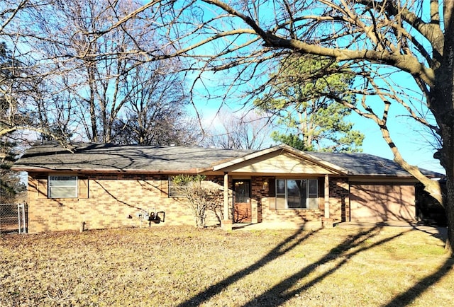 ranch-style home with a front yard