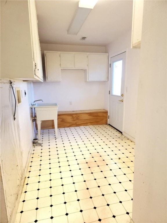 kitchen with white cabinets