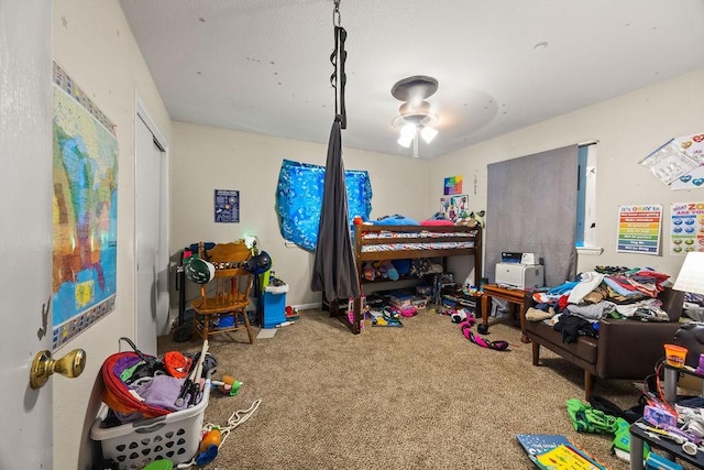 carpeted bedroom featuring a closet