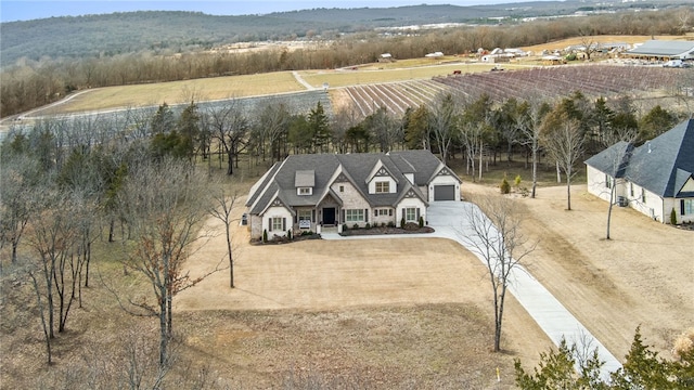 drone / aerial view featuring a mountain view