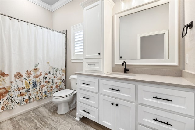 full bathroom with shower / bath combination with curtain, ornamental molding, toilet, and vanity